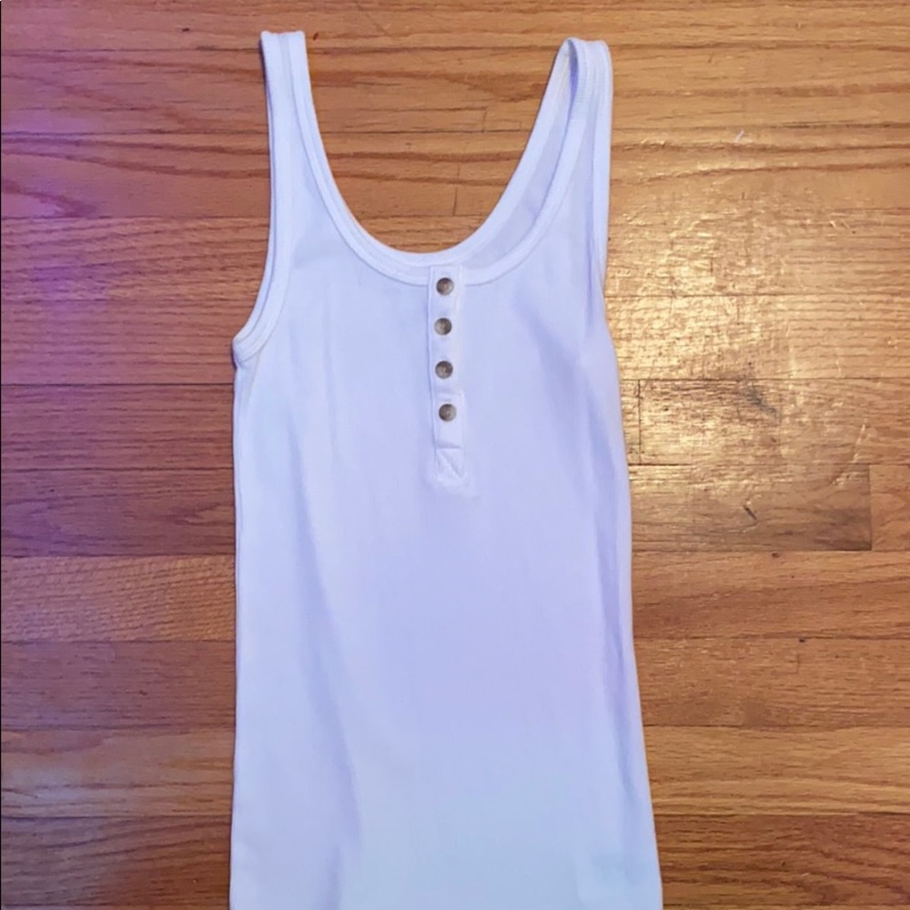 AE white tank top with brown buttons.